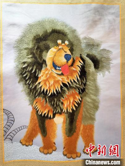 圖為藏繡作品?！∑钤鲚?攝