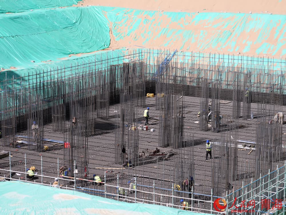 華電2×66萬千瓦煤電項目施工。人民網(wǎng) 況玉攝