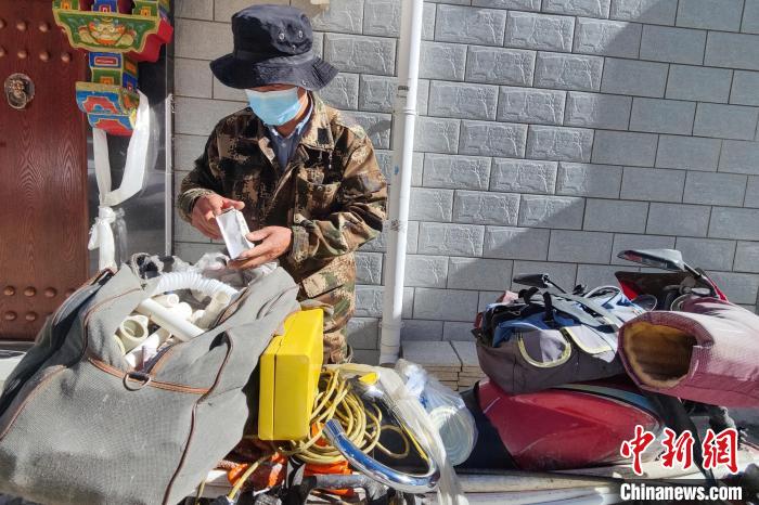 拉薩居民守望相助抗疫：大家的關(guān)系、距離更近了